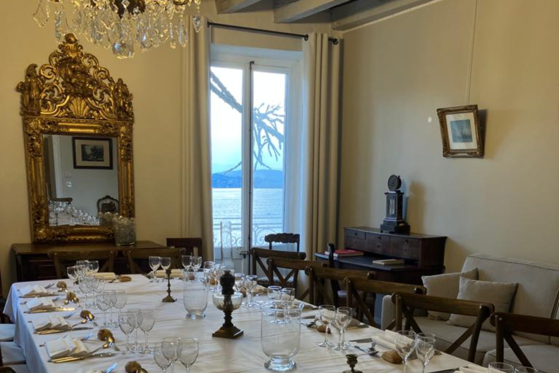 Dining room set for a seminar meal with a view over the lake